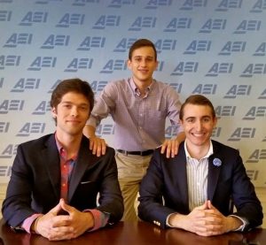 AHI Undergraduate Fellow Philip Parkes (seated on the left)